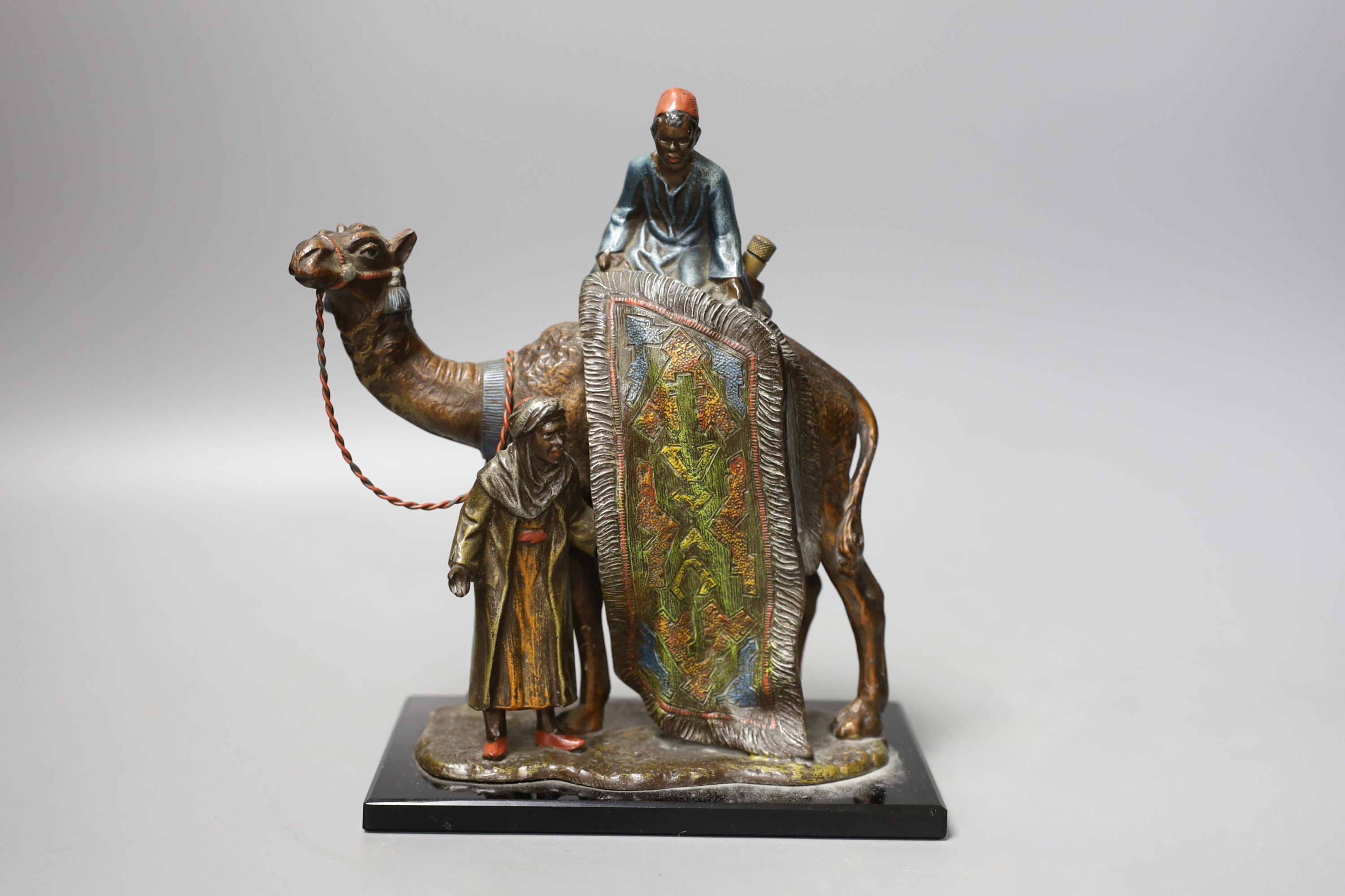 A cold painted metal ‘rug sellers and camel’ table lighter in Bergman style 19cm